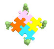 Four puppets, holding in hands a puzzle