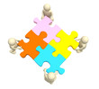 Four puppets, holding in hands a puzzle
