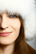Portrait beautiful girl wearing white fur