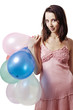 Smiling girl holding balloons