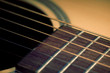 An acoustic guitar close up An acoustic guitar close up