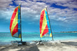 Two catamarans on a beach