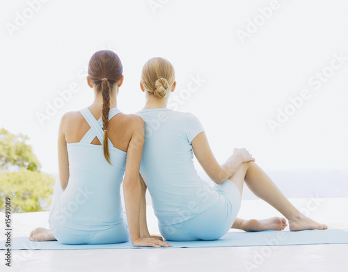 Photo: Rear view of two women outdoors Rear view of two women outdoors