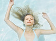Woman floating in water