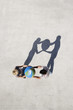 Aerial View of two people with shadow and globe