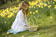Young Girl Collecting Easter Eggs