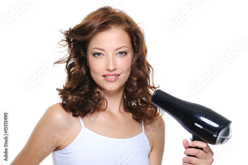 Foto: woman with fashion hairstyle holding hairdryer woman with fashion hairstyle holding hairdryer