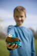 Young Boy Holding Chocolate Easter Egg