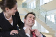Business colleague getting congratulated on success.