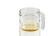 Glass jug with water and lemon