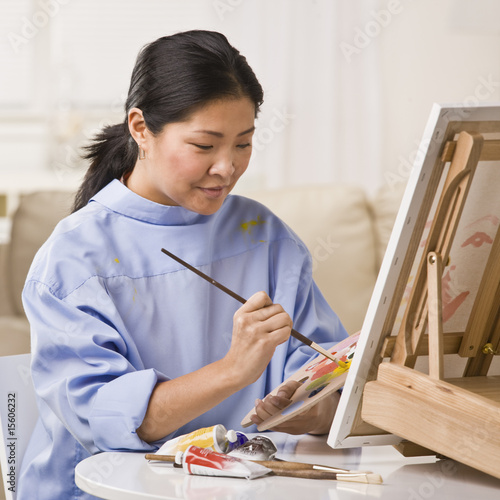 Photo: Woman Painting Picture Woman Painting Picture