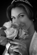 Bride Sniffing Her Bouquet of Flowers Bride Sniffing Her Bouquet of Flowers