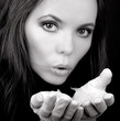 Charming blowing woman in monochrome