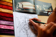 She paints a project plan and choose furniture She paints a project plan and choose furniture