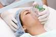 Beautiful patient receives anaesthetic