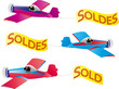 soldes, bannière à la traine d'un avion