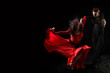 dancer in action against black background