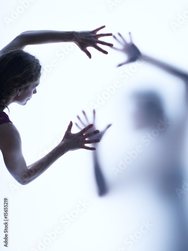 Photo: Two people reaching out to each other Two people reaching out to each other