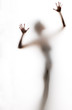 Foto: abstract, elongated, semi-obscured figure with arms raised abstract, elongated, semi-obscured figure with arms raised