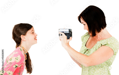 Photo: Woman filming girl Woman filming girl