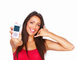 Portrait of a smiling young lady gesturing and holding c