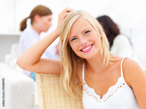 Photo: Closeup portrait of a pretty blond woman smiling Closeup portrait of a pretty blond woman smiling
