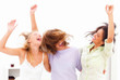 Photo: Blur view of three happy young female friends enjoying Blur view of three happy young female friends enjoying