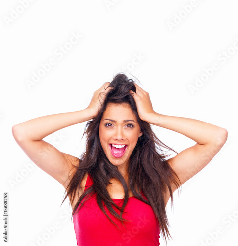 Photo: Laughing young girl in red top isolated on white background Laughing young girl in red top isolated on white background