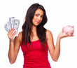 Portrait of a smiling woman holding money and piggy bank