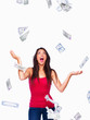 Portrait of a happy girl holding money isolated on white