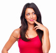 Young woman with fingers on cheek isolated on white background