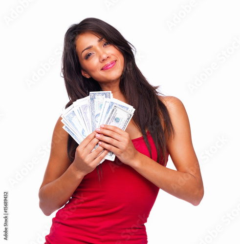 Foto: Portrait of a smiling woman holding money Portrait of a smiling woman holding money