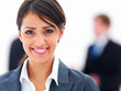 Portrait a of young beautiful woman and businesspeople in backgr