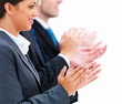 Photo: Closeup of young business lady clapping hands with colleagues Closeup of young business lady clapping hands with colleagues