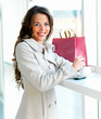 woman taking a tea break from shopping