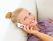 Closeup of a young pretty woman using cellphone