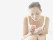 A woman doing her nails
