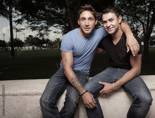 Photo: Two handsome young gay men in the park Two handsome young gay men in the park