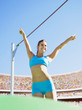 Athlete after pole vault in an arena