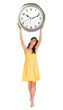 woman holding clock in her hands
