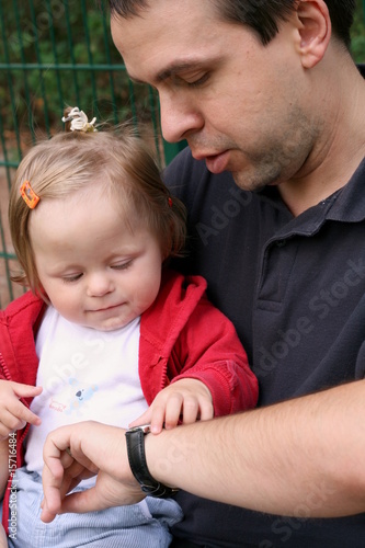 Photo: father is playing with his daughter father is playing with his daughter