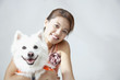 Woman with dog indoors
