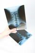 Doctor hand picking up x ray