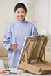 Woman Painting Picture