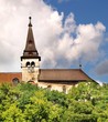 A view of clock tower of famous Orava Castle, in summer. A view of clock tower of famous Orava Castle, in summer.