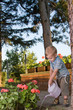 Boy watering flowers 2