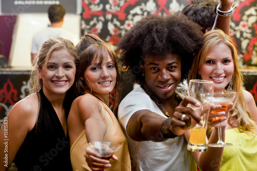 Photo: Friends at a bar Friends at a bar