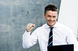 Closeup Of A Successful Man With Laptop