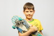 Foto: The boy with a skateboard The boy with a skateboard