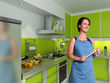 Smiling cook in a modern kitchen